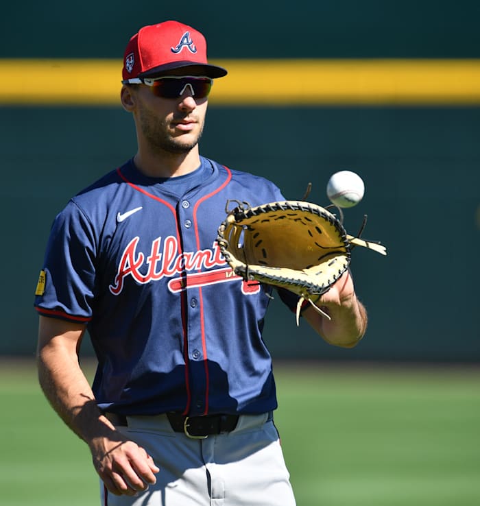 Atlanta Braves infielder Matt Olson (#28) warms up at the start of practice Tuesday, Feb. 20, 2024 at CoolToday Park in North Port, Florida.  